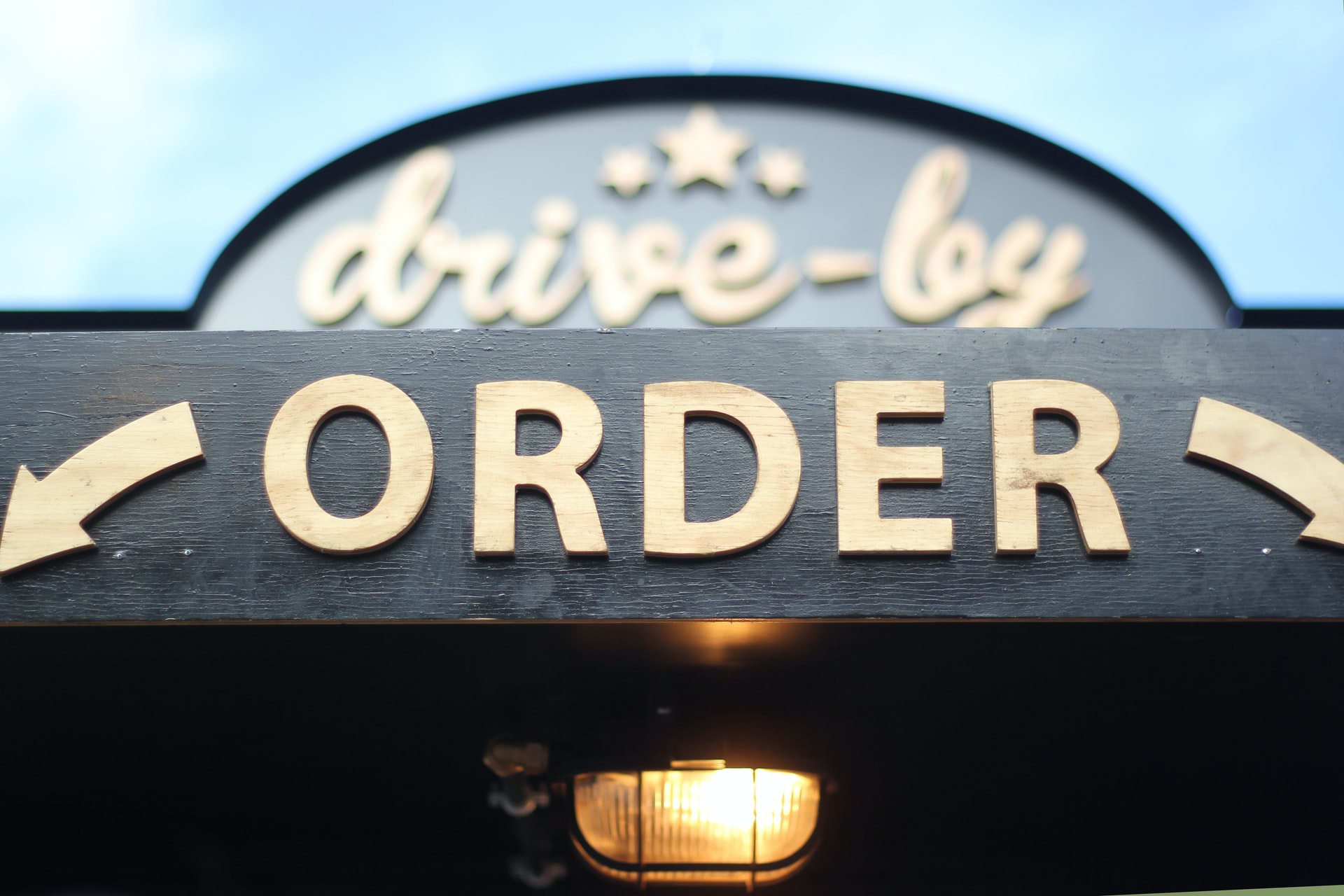 Drive by orders sign